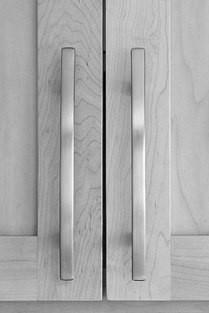 brushed silver door handles on maple cabinet doors